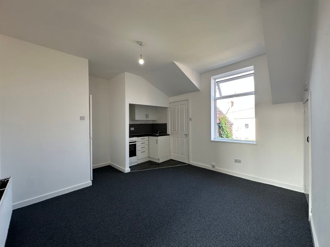 Living Room/ Kitchen